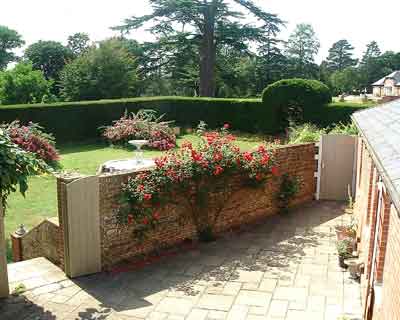 Dairy Cottage, Yard looking South West'.
